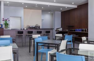 Restaurace v ubytování Hotel Olympia Universidades