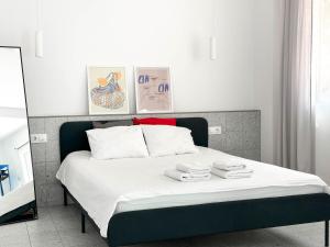 Postel nebo postele na pokoji v ubytování Apartamentos Navío