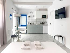 Kuchyň nebo kuchyňský kout v ubytování Apartamentos Navío + 14 fotografií