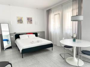 Ένα ή περισσότερα κρεβάτια σε δωμάτιο στο Apartamentos Navío