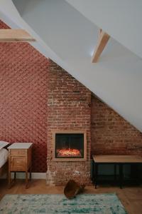 Ένα ή περισσότερα κρεβάτια σε δωμάτιο στο The Lovelace Residence by Threads of Time Hotel Bruges
