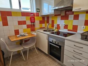 Η κουζίνα ή μικρή κουζίνα στο BLife Ceriya private apartment