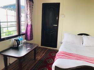Postelja oz. postelje v sobi nastanitve Mita Hotel-Resort Marga