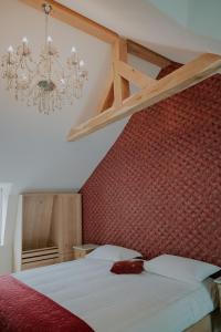 Ένα ή περισσότερα κρεβάτια σε δωμάτιο στο The Lovelace Residence by Threads of Time Hotel Bruges