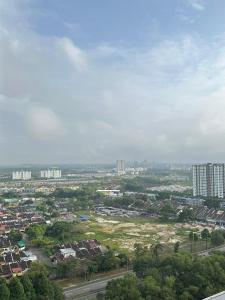 an aerial view of a city with tall buildings at Joan's Hideout Sky Trees Serviced Apartment 4 pax JB Aeon Bukit Indah in Johor Bahru