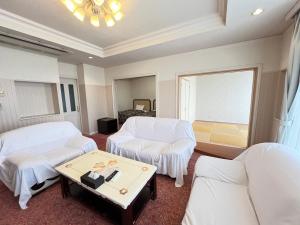 Postel nebo postele na pokoji v ubytování Spa Resort LiVEMAX