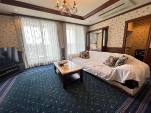 Postel nebo postele na pokoji v ubytování Spa Resort LiVEMAX