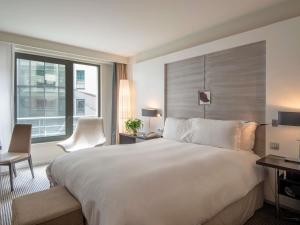 Postel nebo postele na pokoji v ubytování Sofitel Brussels Europe