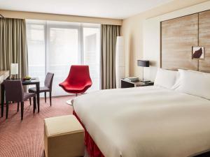 Postel nebo postele na pokoji v ubytování Sofitel Brussels Europe