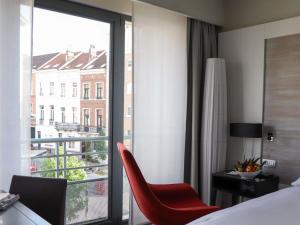 Postel nebo postele na pokoji v ubytování Sofitel Brussels Europe