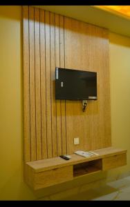 TV a/nebo společenská místnost v ubytování Hotel Dinanath