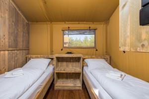 Postel nebo postele na pokoji v ubytování Papafigo Camping + 37 fotografií