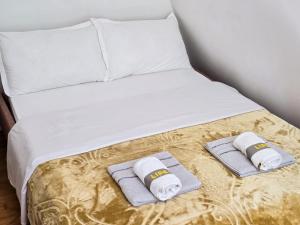 Postel nebo postele na pokoji v ubytování Arditi's Chalets