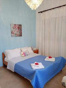 Postel nebo postele na pokoji v ubytování Gaios Rest Apartment Comfort Location Paxos Hospitality + 37 fotografií