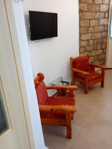 TV a/nebo společenská místnost v ubytování Gaios Rest Apartment Comfort Location Paxos Hospitality
