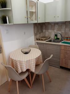 Kuchyň nebo kuchyňský kout v ubytování Gaios Rest Apartment Comfort Location Paxos Hospitality