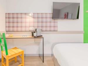 Postel nebo postele na pokoji v ubytování greet hôtel Annecy Cran-Gevrier by Accor