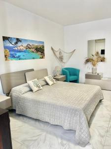 Postel nebo postele na pokoji v ubytování B&B I Colori Dell'Isola