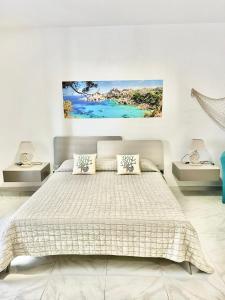 Postel nebo postele na pokoji v ubytování B&B I Colori Dell'Isola