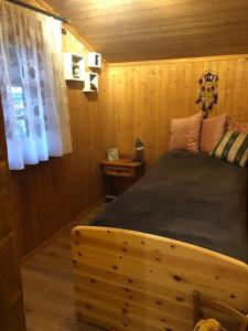 Postel nebo postele na pokoji v ubytování Chalet Mex 15