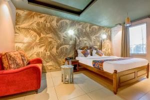 Postel nebo postele na pokoji v ubytování FabHotel The Rajmani