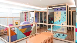 Uma ou mais camas em beliche em um quarto em Cavo Maris Beach Hotel