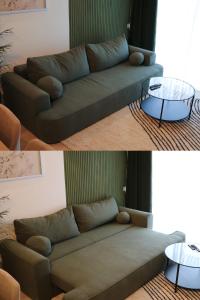una sala de estar con un sofá y una mesa en The Lake Home B1 ap13, en Sibiu