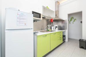 Kuchyň nebo kuchyňský kout v ubytování BLife Riamya private apartment