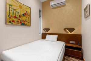 Postel nebo postele na pokoji v ubytování Rixwell Collection Seaside Hotel Jurmala
