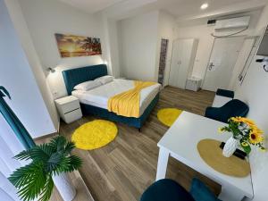 Postel nebo postele na pokoji v ubytování Kangaroo Apartmani