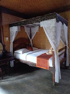 Letto o letti in una camera di Yoschi's Hotel Bromo