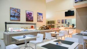 Et tv og/eller underholdning på Comfort Hotel Taguatinga