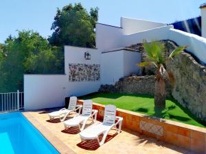 Swimmingpoolen hos eller tæt på Villasecre Casa Rural