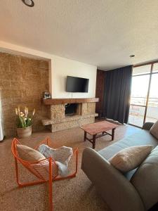 TV a/nebo společenská místnost v ubytování Nogalera Confort Apartments + 86 fotografií