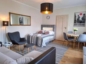 Posteľ alebo postele v izbe v ubytovaní Apartament Nectar Pond