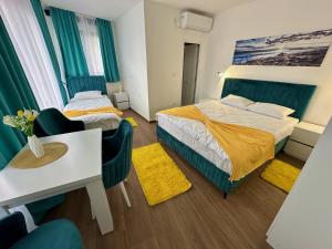 Postel nebo postele na pokoji v ubytování Kangaroo Apartmani