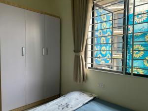 Ein Bett oder Betten in einem Zimmer der Unterkunft nhatroduytan