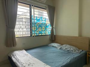 Ein Bett oder Betten in einem Zimmer der Unterkunft nhatroduytan
