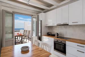 A kitchen or kitchenette at Gonia Residences