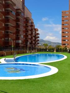 Bazén v ubytování Playa Coral II 3 Nº 1054 nebo v jeho okolí