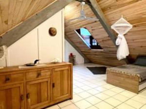 a bathroom with a sink and a staircase in a house at Villa Kaz K vue sur la mer des Caraibes in Bouillante