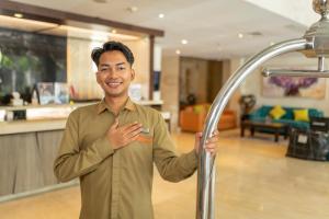 Členové personálu v ubytování Oria Hotel Jakarta