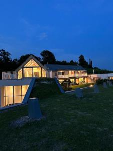 a house with a skateboard ramp in front of it at MASTER Suite CasaFux am Graßnitzberg in Grassnitzberg