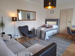 Posteľ alebo postele v izbe v ubytovaní Apartament Nectar Pond