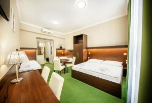Ein Bett oder Betten in einem Zimmer der Unterkunft Martin Hotel Prague