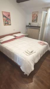 Postel nebo postele na pokoji v ubytování XX Settembre 43 n2