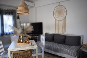 Posezení v ubytování Platamon Boho Apartment- Με θέα την θάλασσα