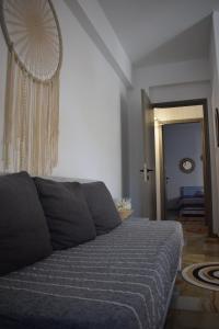 Postel nebo postele na pokoji v ubytování Platamon Boho Apartment- Με θέα την θάλασσα