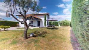 Κήπος έξω από το O Coeur du Bois