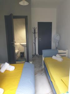 Postel nebo postele na pokoji v ubytování Chalkidiki White Kallithea Apartments